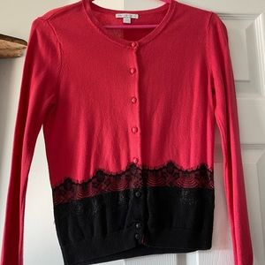 Pink and black sweater